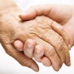 elderly hand holding